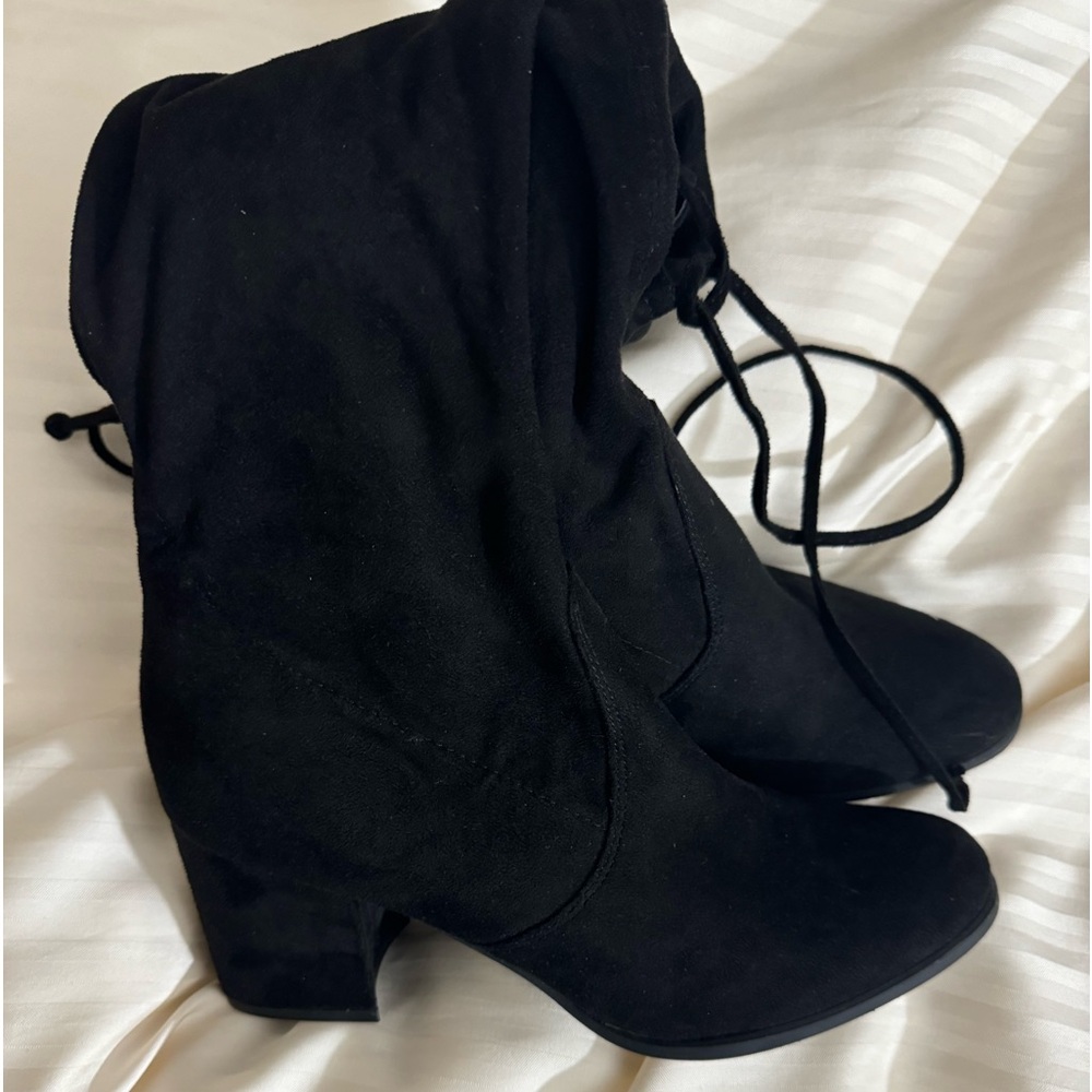 Black over the knee high heel boots size 8 in excellent condition.